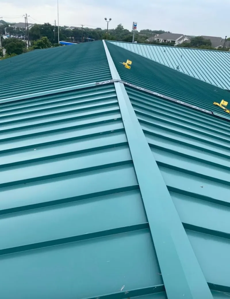 Green commercial metal roof ridge and valley for Metal Roof Repair in Ankeny