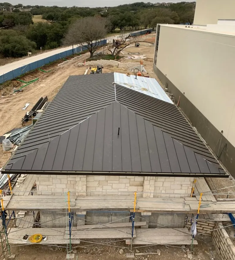 Metal roof new construction with scaffolding in Ankeny