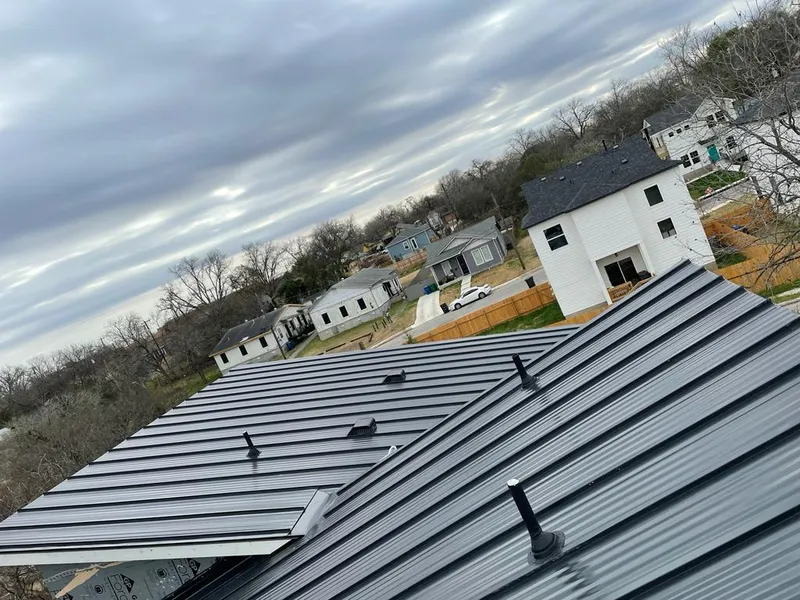 Standing seam metal roof panels with vents for Skylight Repair in Ankeny